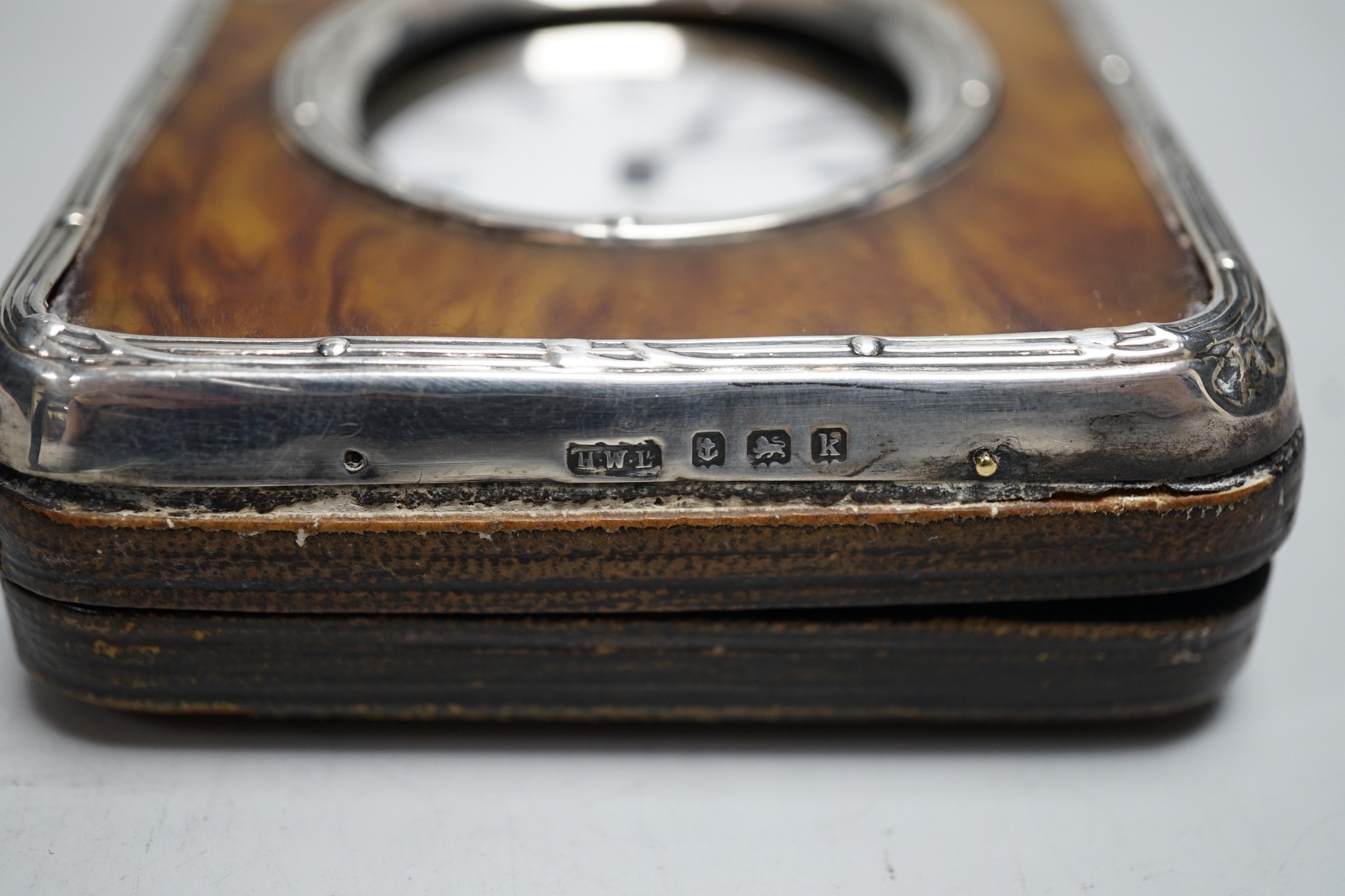A tortoiseshell hallmarked silver pocket watch holder